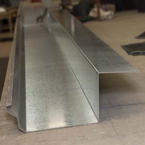 Custom gutter fabrication
